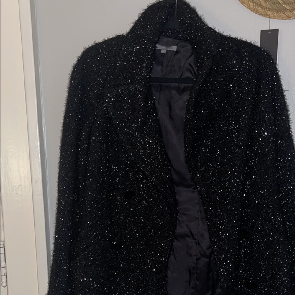 Black pea coat at sparkles in the light